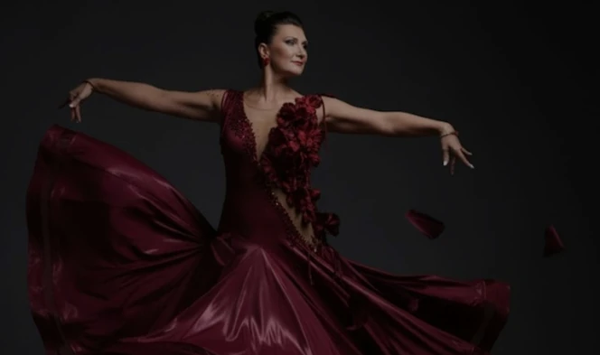 Dancer wearing Burgundy Blossom on the competition floor